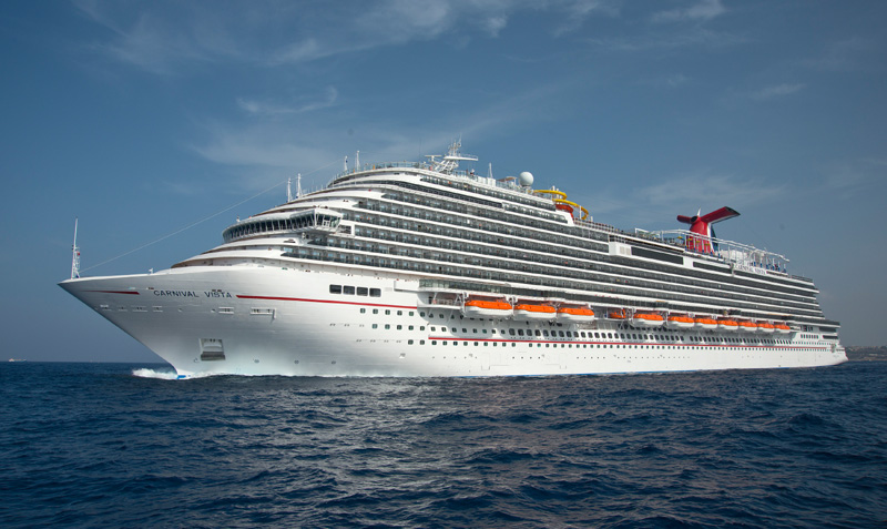 The Carnival Vista cruises at sea.