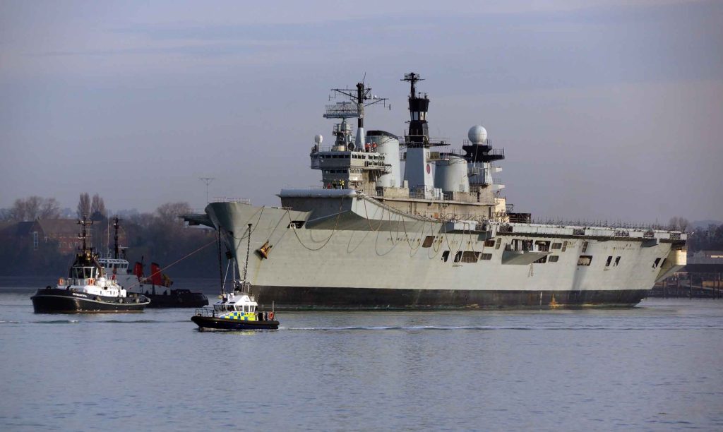 Former aircraft carrier Illustrious departs Portsmouth for last time ...