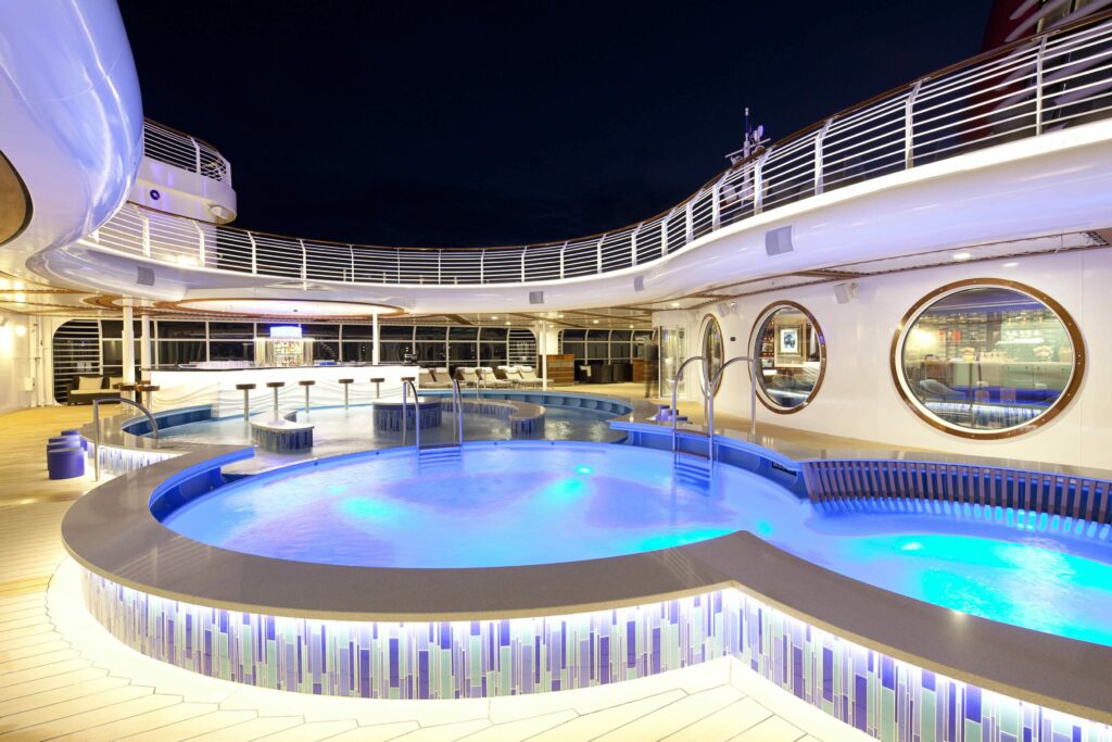 On the Disney Dream, adults can relax at Quiet Cove Pool. In this multi-level pool with varying depths, adults can fully immerse themselves in a tranquil environment to soak up the sun, bask in warm tropical breezes or enjoy a beverage at the poolside bar. (Matt Stroshane, photographer)