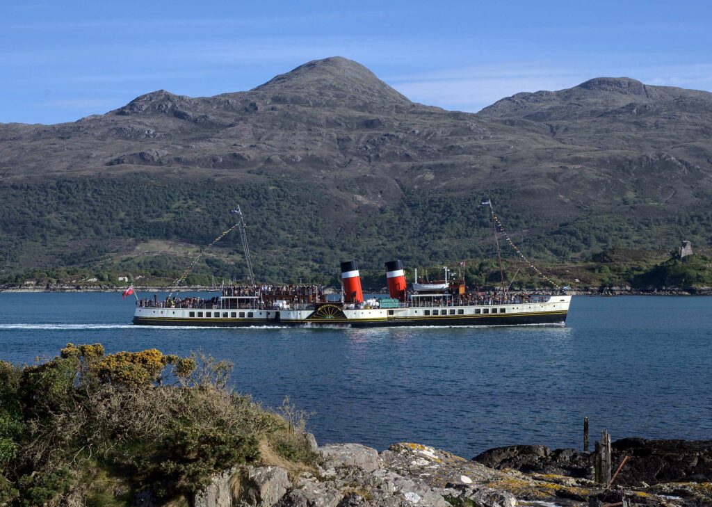 Waverley departs Kyle of Lochalsh past Castle Moil, to cruise past Plockton through the Strome Narrows on 20th May 2025 ANDREW YOUNG